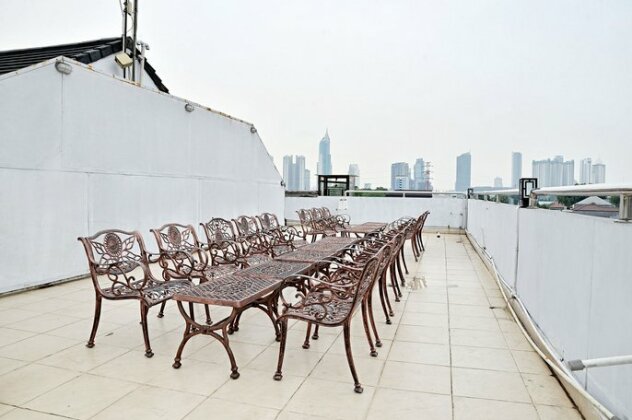 ZEN Rooms Benhil Tondano - Photo4