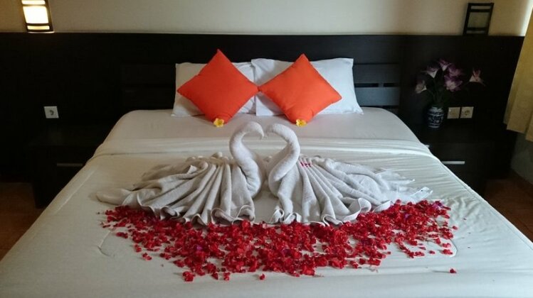 Agus Beach Inn - Photo2