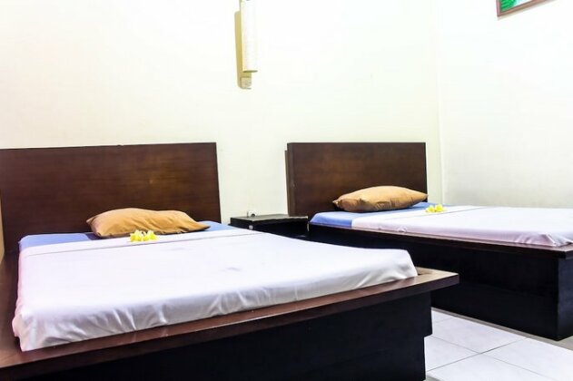 Budhi Beach Inn - Photo2