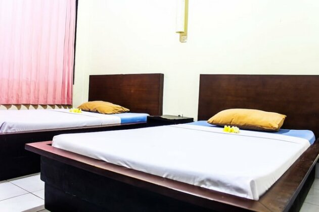 Budhi Beach Inn - Photo4