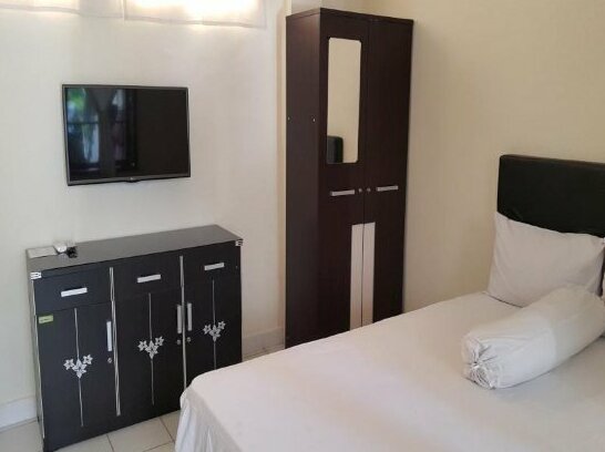 Paradise Inn Kuta - Photo4