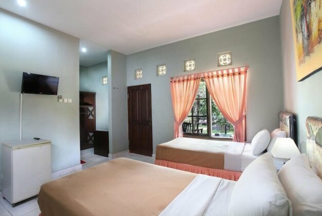 Sari Bali Cottage - Photo5
