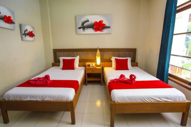 Secret Garden Inn Kuta - Photo2