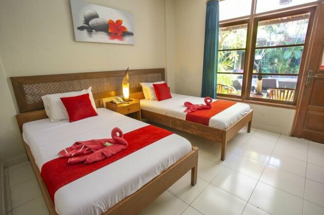 Secret Garden Inn Kuta - Photo4
