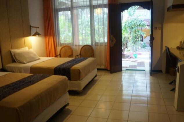 Puri Naga Beachfront Cottages - Photo5