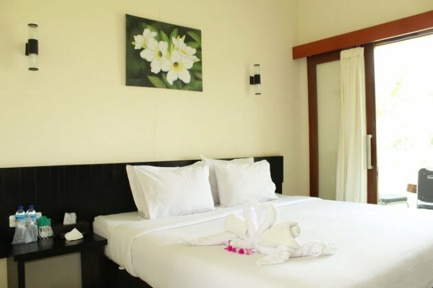 Gondang Beach Hotel - Photo4