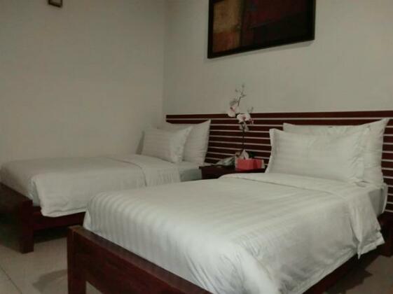 D'Primahotel By Home In Airport Makassar - Photo3