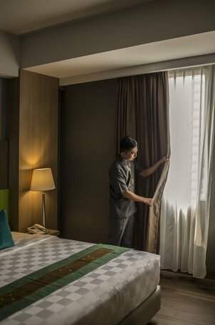 Pesonna Hotel Makassar - Photo4