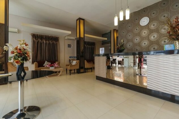 RedDoorz Plus @ Grand Populer Hotel - Photo2