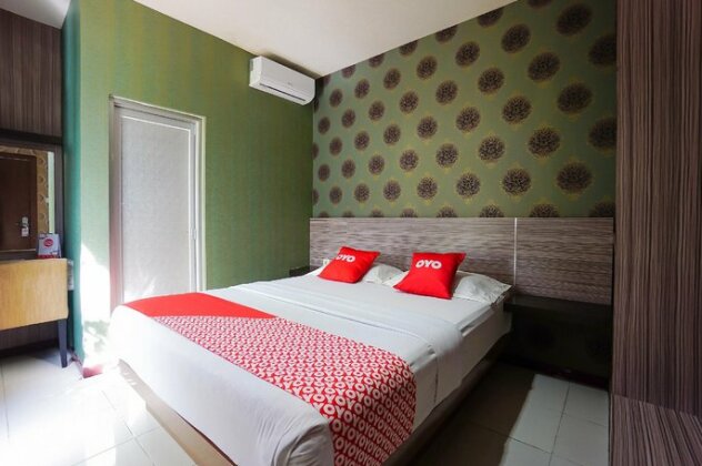 OYO 2526 Hotel D'komo - Photo4