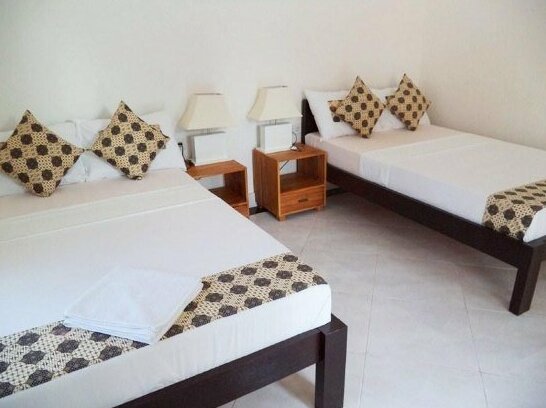 Made's Homestay - Photo4