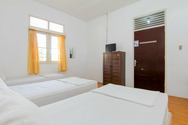 Lestari Guesthouse - Photo4