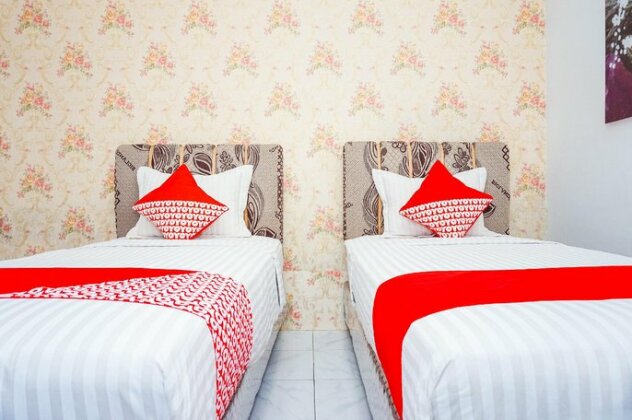 OYO 433 Nelvi Residence Syariah - Photo5