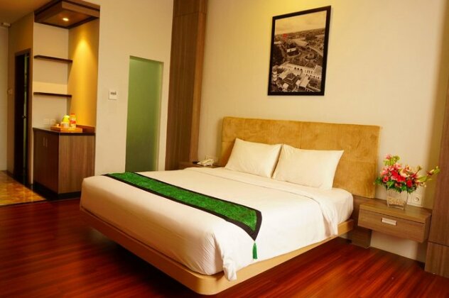 Airish Hotel Palembang - Photo4