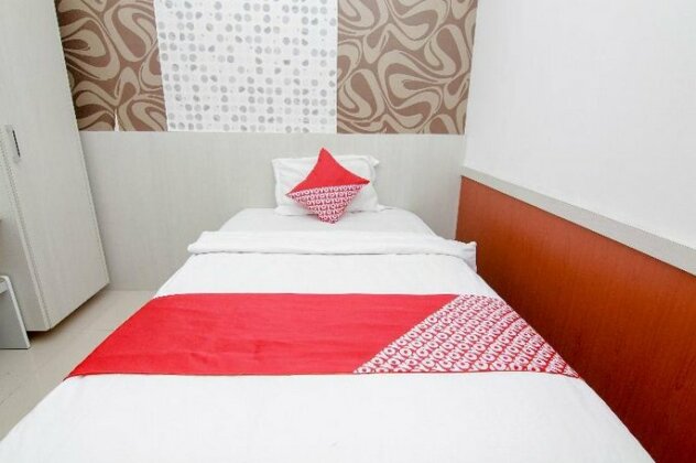 OYO 861 R Four Hotel - Photo4