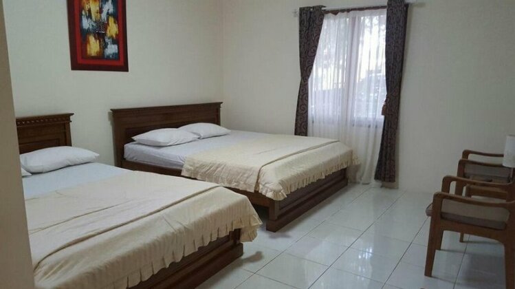 Nusawiru Guest House - Photo4