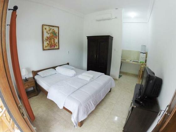 Uluwatu Made Guesthouse - Photo4