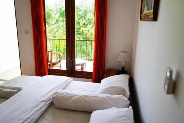 Uluwatu Made Guesthouse - Photo5