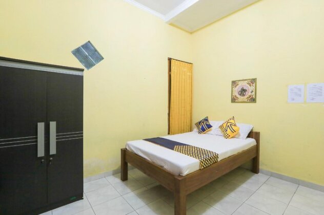 SPOT ON 2440 Wallet Family Residence - Photo2