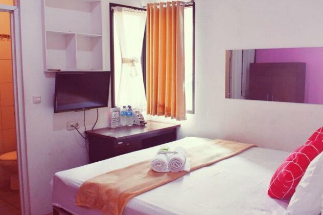 Griya Rattu Kost N Guesthouse - Photo2