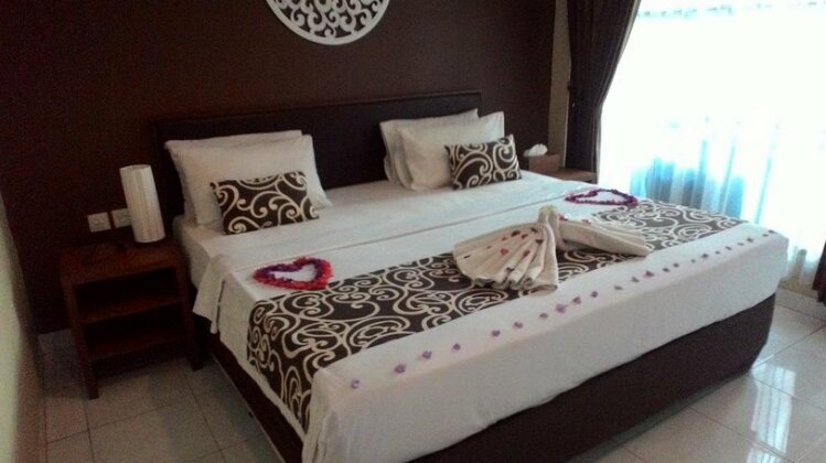 OYO 817 Mesari Beach Inn - Photo2
