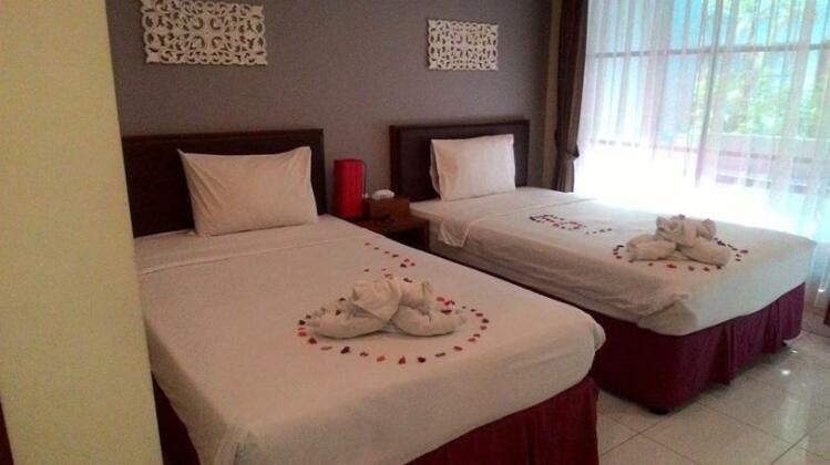 OYO 817 Mesari Beach Inn - Photo4