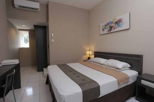 RedDoorz @ Sunset Point Seminyak - Photo5