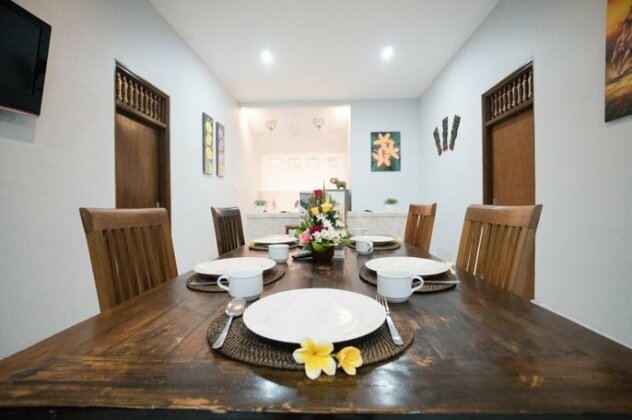 The Catur Guesthouse - Photo4