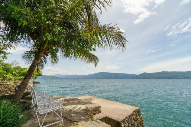 RedDoorz @ Tuktuk Danau Toba - Photo4