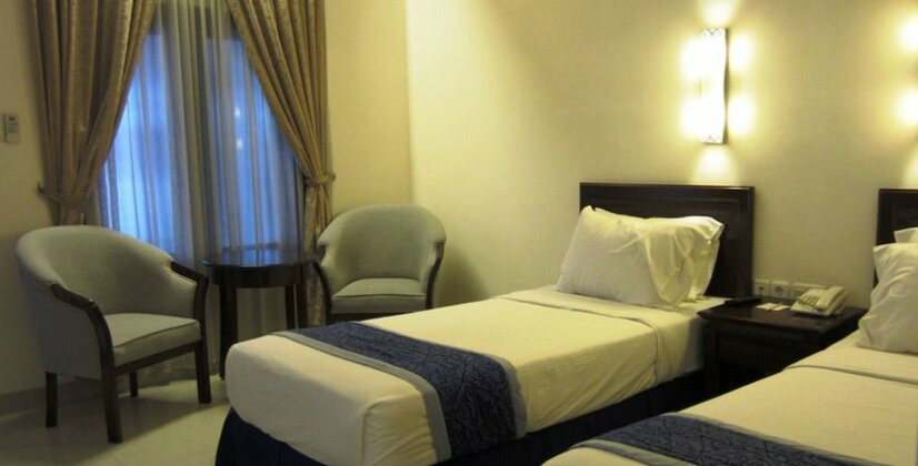 Grand Orchid Hotel - Photo4