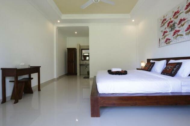 Putra Bisma Guesthouse - Photo2