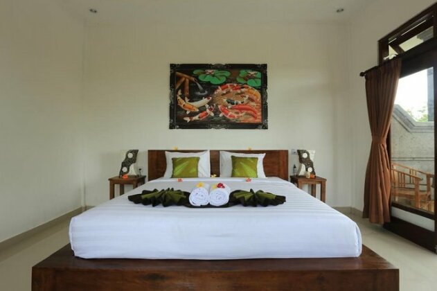 Putra Bisma Guesthouse - Photo5
