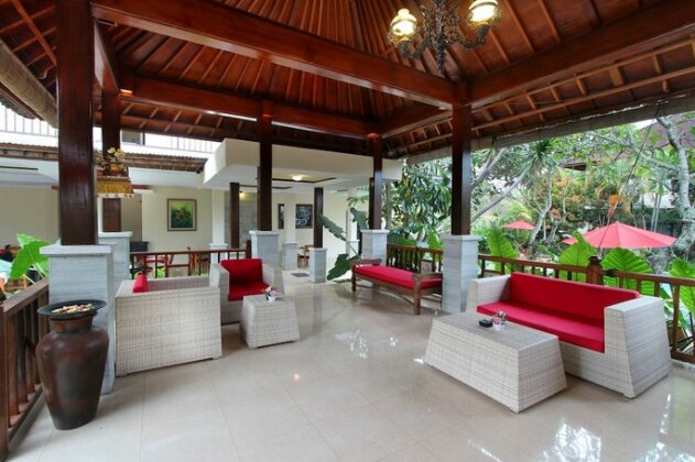 Putri Ayu Cottages - Photo3