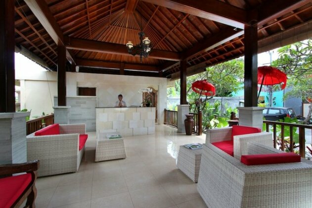 Putri Ayu Cottages - Photo4