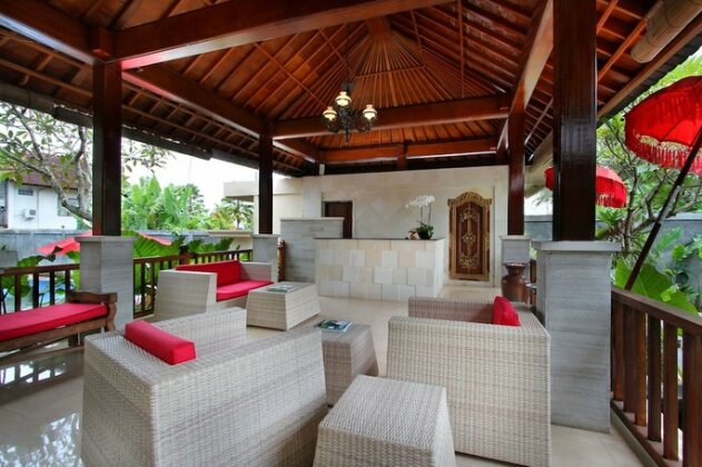 Putri Ayu Cottages - Photo5