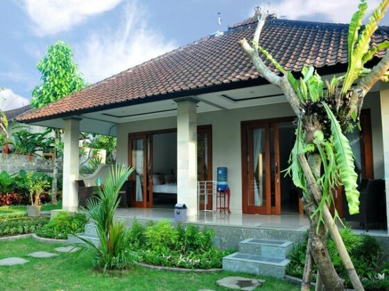 Putu's Paradise Guesthouse - Photo2