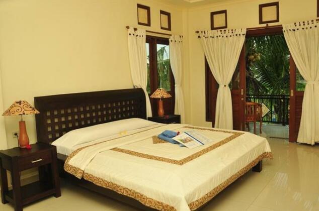 Three Dewi's Guest House - Photo5
