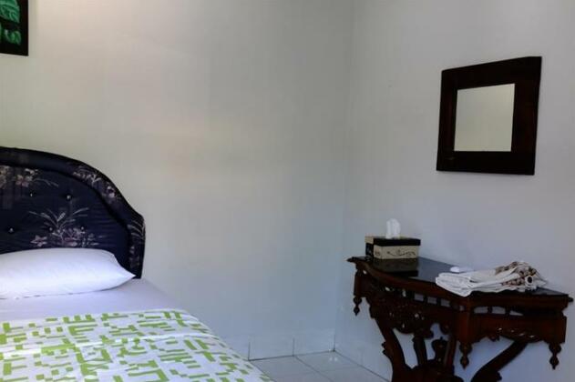 D'Kampoeng Homestay - Photo4