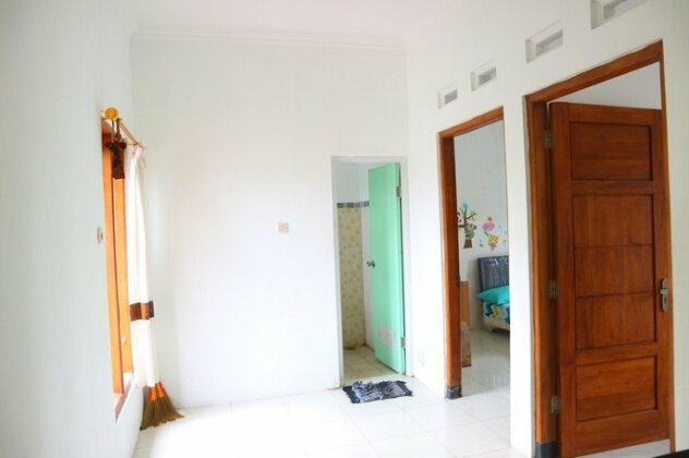 Rajawali Guesthouse - Photo2