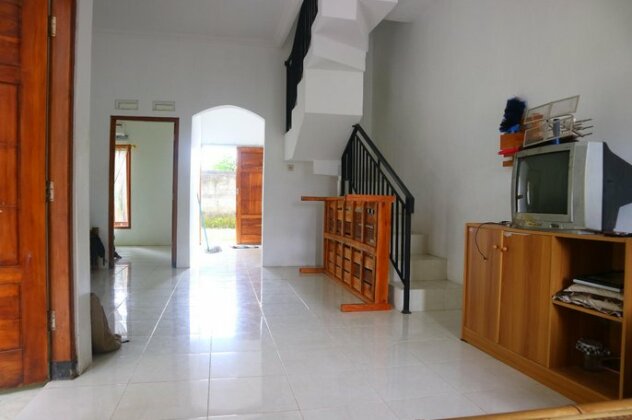 Rajawali Guesthouse - Photo5