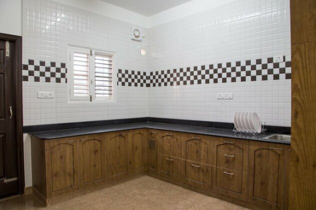 OYO 9252 SLN Homes - Photo4