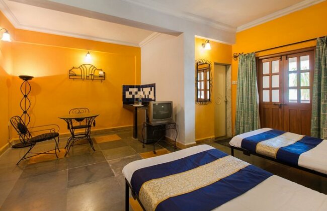 OYO Premium 173 Beside Radisson Blu Candolim - Photo4