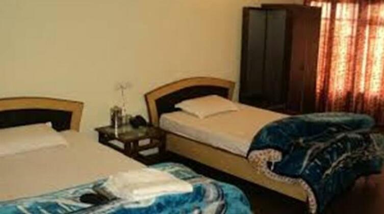 Hotel Travellers Paradise - Photo3