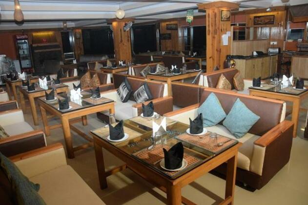 Zinnia Hotels and Resort - Photo2