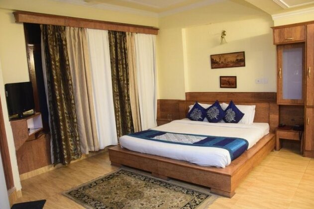 Zinnia Hotels and Resort - Photo3