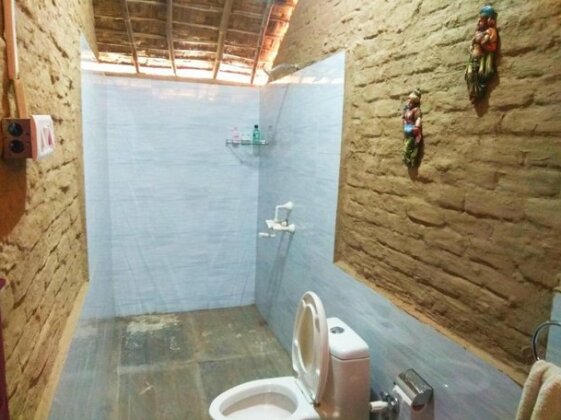 Mudhouse Under Mangoes Homestay - Photo4