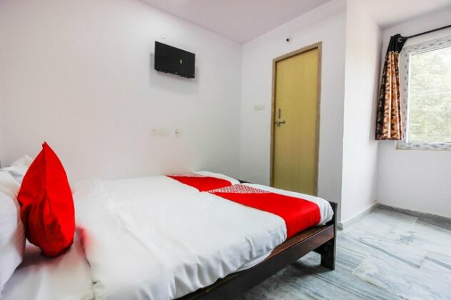 OYO 67445 Ht Guest House - Photo2