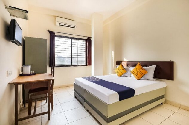 SPOT ON 66175 Welcome Stay - Photo2