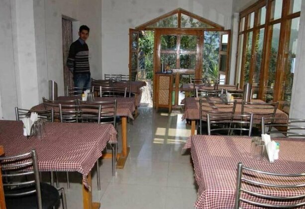 Goroomgo Homestay Kausani - Photo2