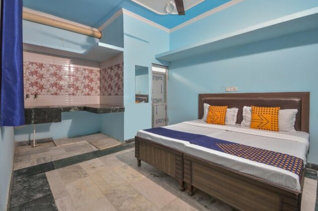 SPOT ON 66570 Dhiman Residency